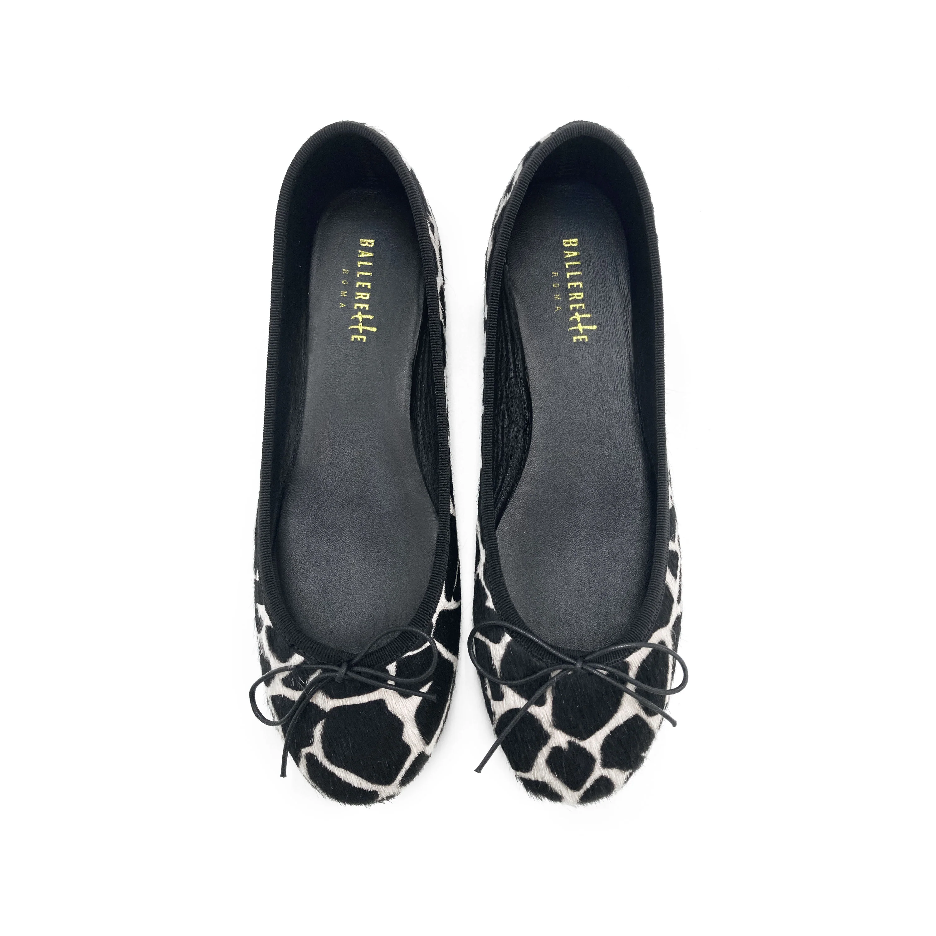 Ballerine animalier in cavallino maculato bianco e nero